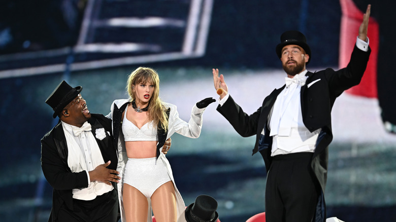 Taylor Swift and Travis Kelce on stage Eras tour