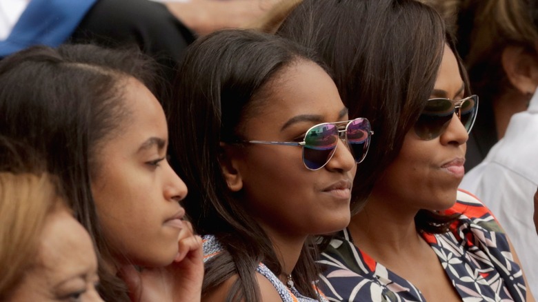 Malia Obama, Sasha Obama, Michelle Obama side profiles