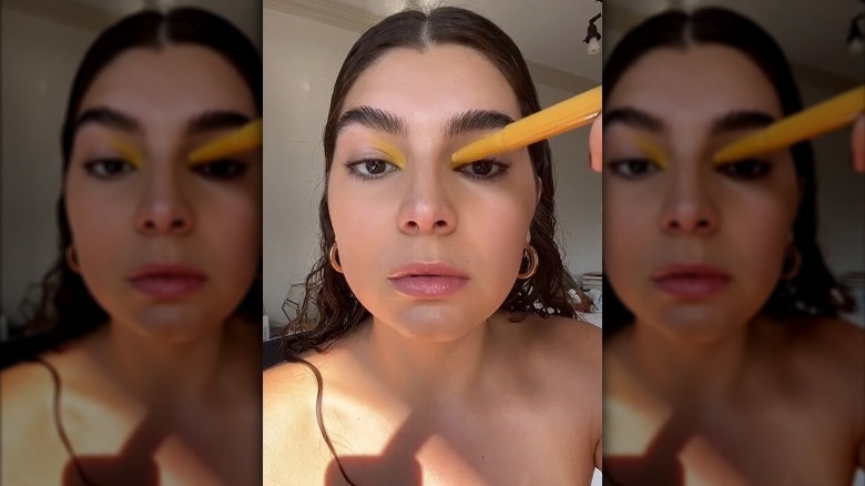 TikTok demonstrating different eyeshadow tools