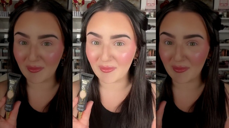 TikTok demonstrating concealer as eyeshadow base