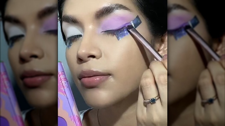 TikTok demonstrating how to use tape to make straight lines