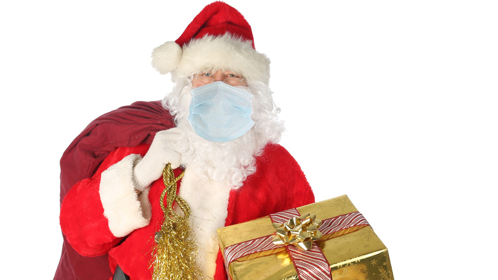 Santa Claus with a face mask