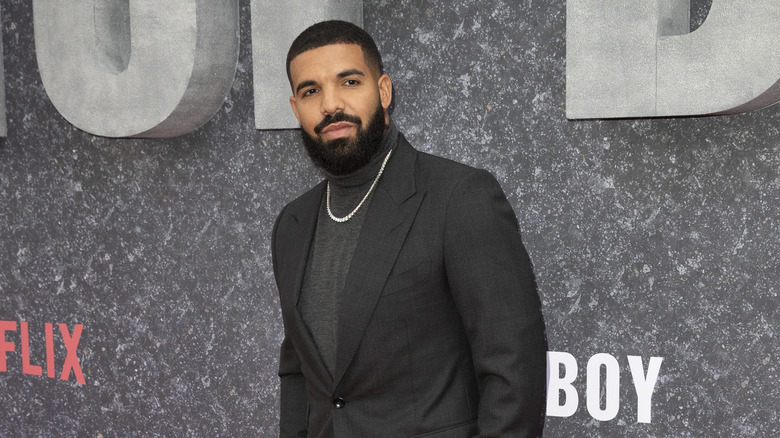 Drake posing on red carpet