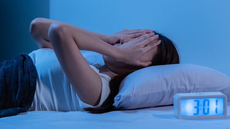 woman having trouble sleeping