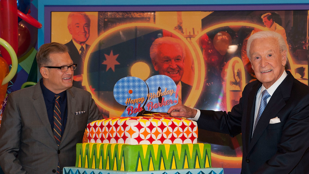 Drew Carey and Bob Barker celebrating Barker's 90th birthday on the set of The Price Is Right