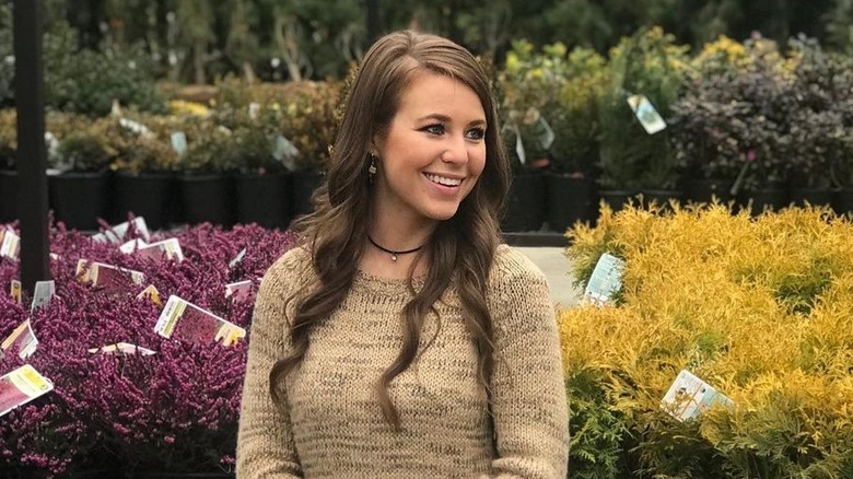 jana duggar smiling outside