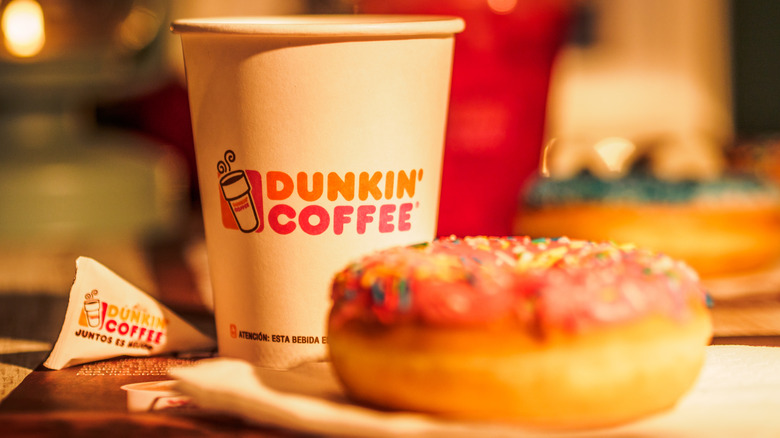 Dunkin' Coffee cup with doughnut