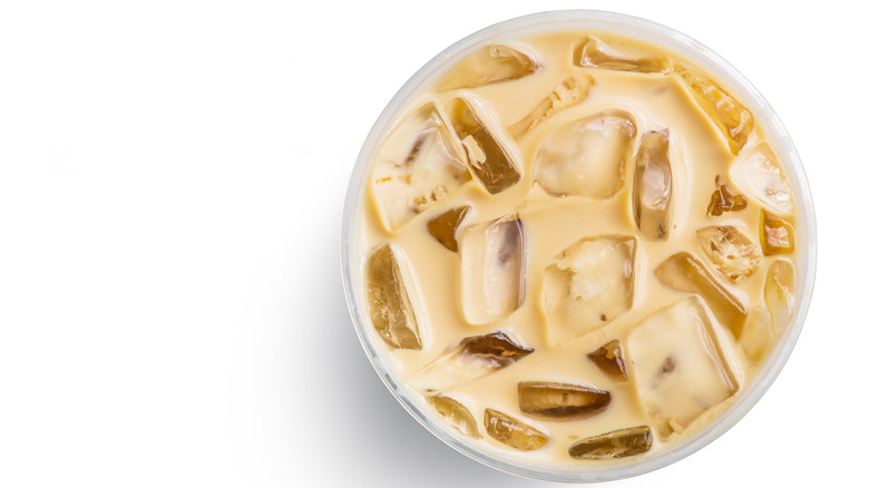 top view of iced coffee on white background