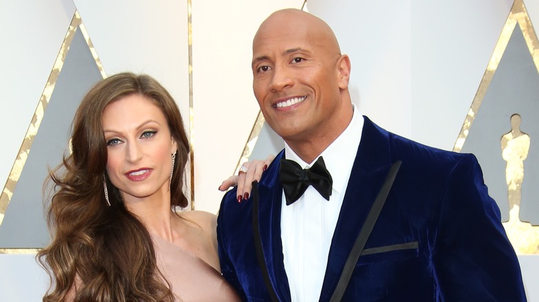 Lauren Hashian and Dwayne Johnson at a red carpet