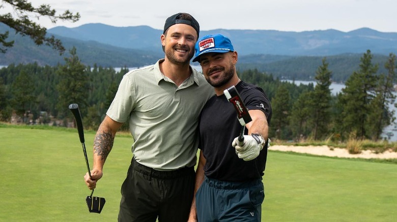 Dylan and Zac Efron at a golf course