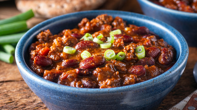 Beef chili in a blue bowl