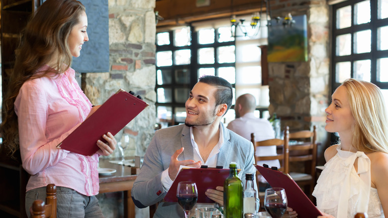 man ordering food for woman, a huge turn-off