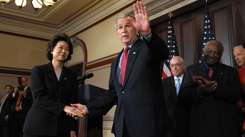 Elaine Chao shaking hands with George W. Bush