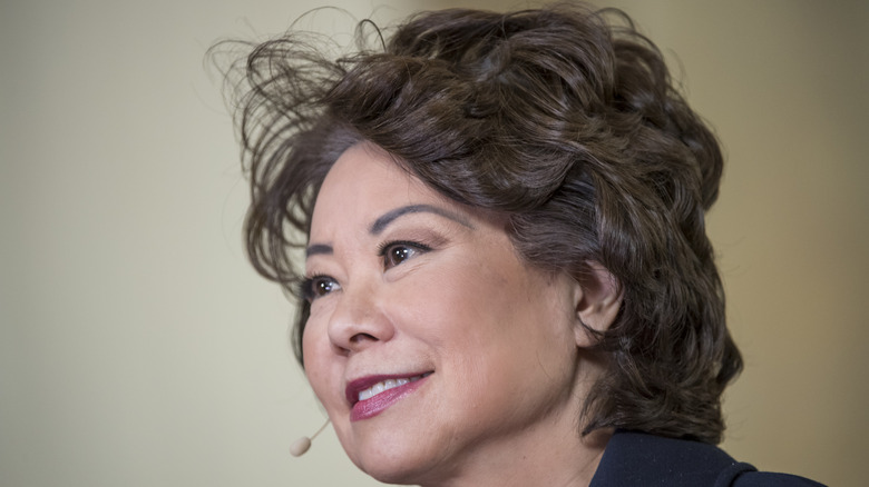 Elaine Chao wearing microphone