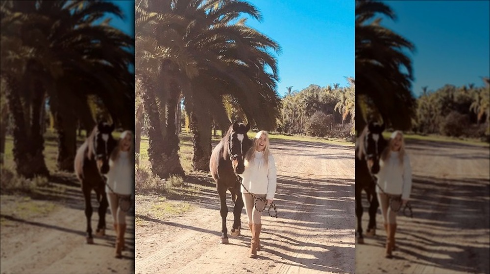 Elaine Culotti walking with horse