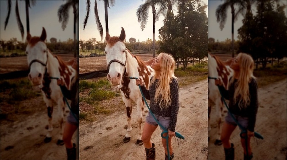 Elaine Culotti walking her horse