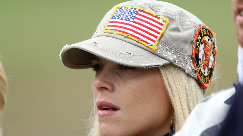 Elin Nordegren wearing a hat at a golf tournament