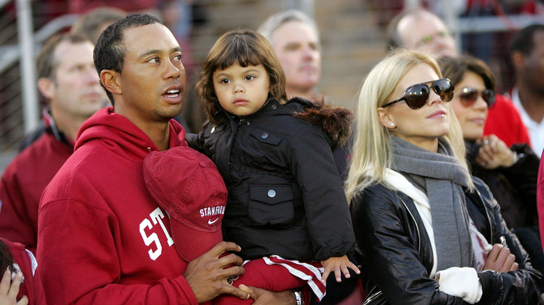 Tiger Woods, Sam Woods, and Elin Nordegren sitting together