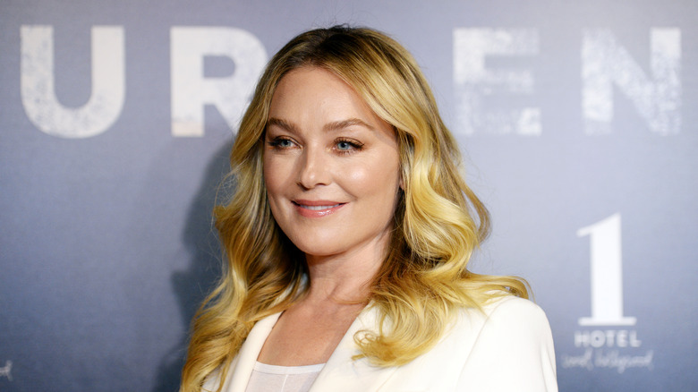 Elisabeth Röhm smiling on the red carpet