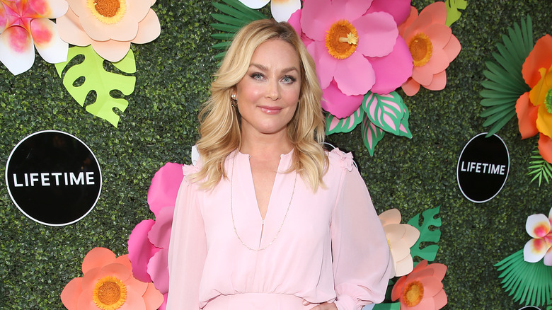 Elisabeth Röhm posing at Lifetime Summer Luau