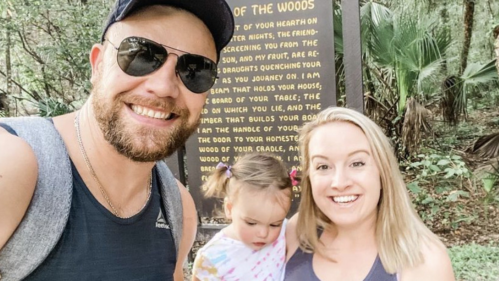 Elizabeth and Andrei with their daughter