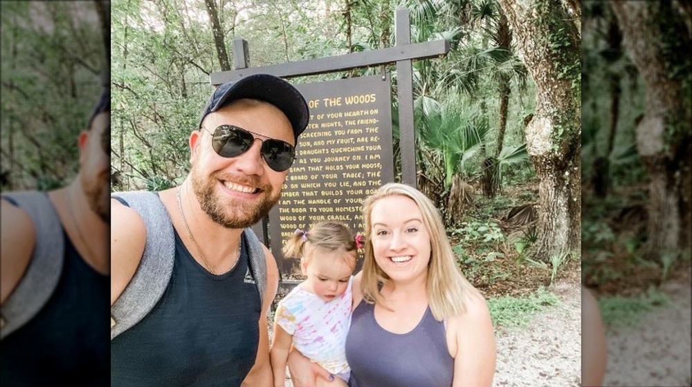 Elizabeth and Andrei from 90 Day Fiancé and their daughter on a hike