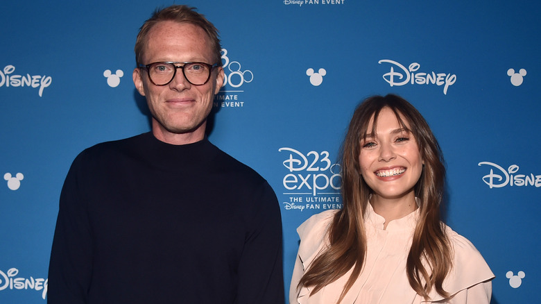 Paul Bettany and Elizabeth Olsen smiling