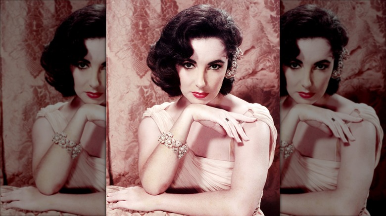 Elizabeth Taylor wearing jewelry