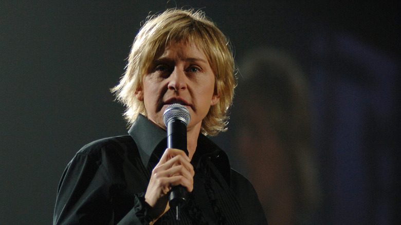 ellen degeneres holding microphone