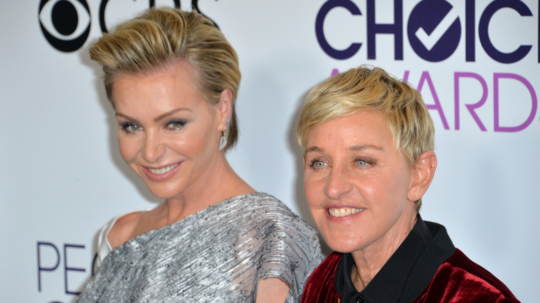 Ellen DeGeneres and Portia de Rossi smiling 