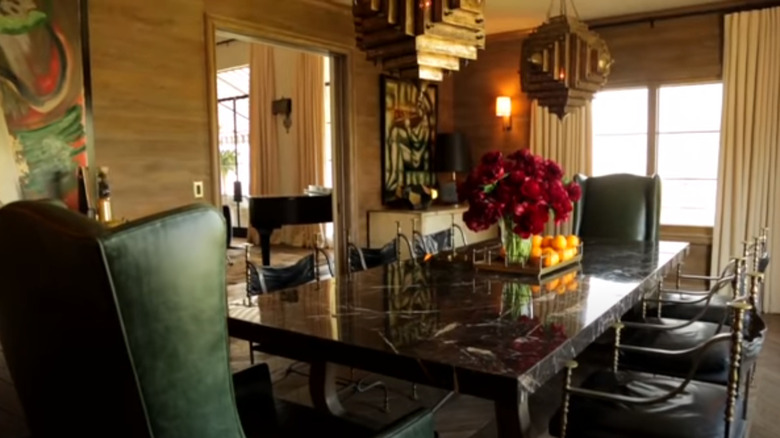 Ellen Pompeo's dinning room with wooden walls 