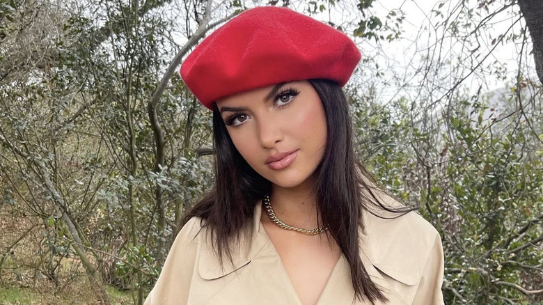 Ellie Zeiler poses in red hat