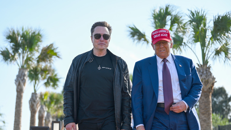 Elon Musk and Donald Trump walk together