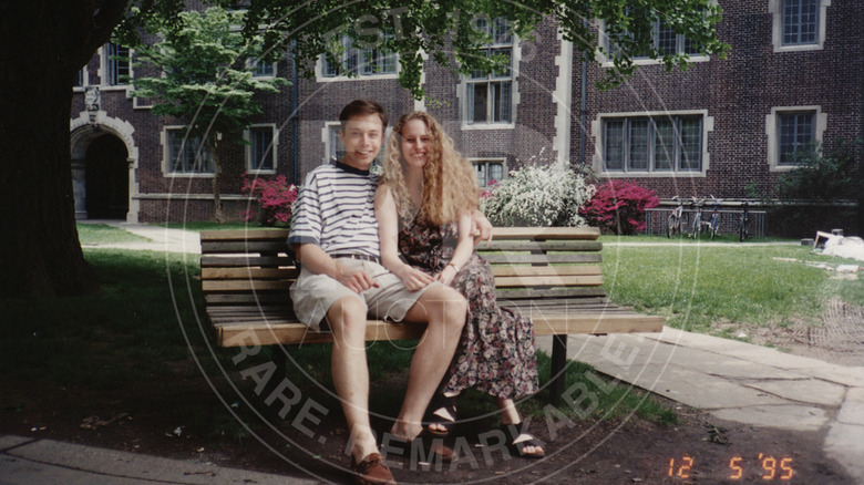 Jennifer Gwynne and Elon Musk sitting on a bench in college