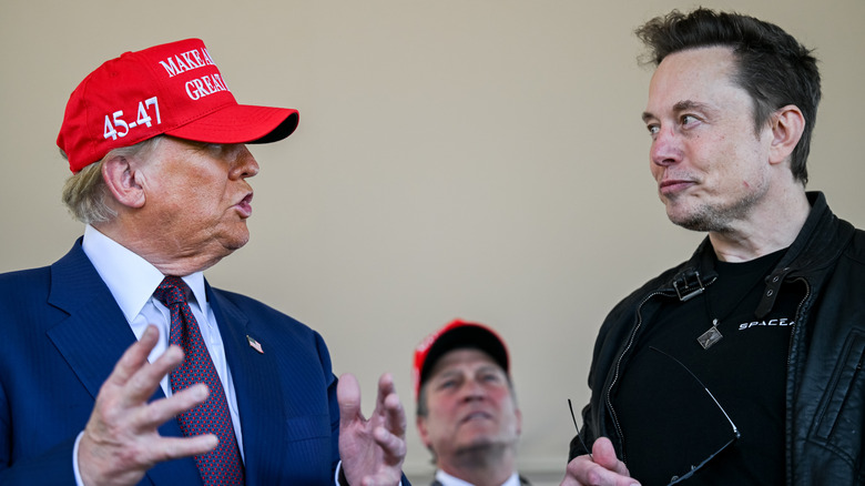 Trump talking in MAGA hat talking to Elon Musk