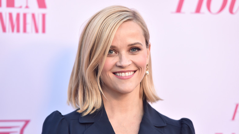 Reese Witherspoon smiling at event