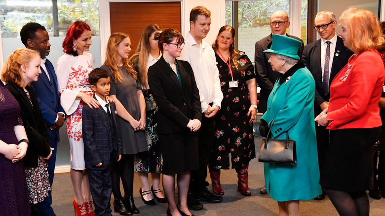 Queen Elizabeth with families