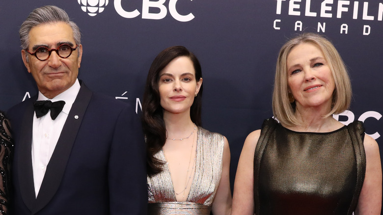 Emily Hampshire with Eugene Levy and Catherine O'Hara