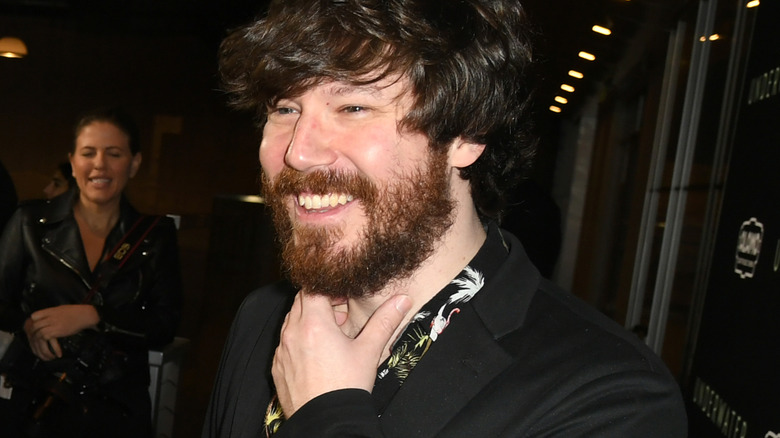John Gallagher Jr. laughing and smiling