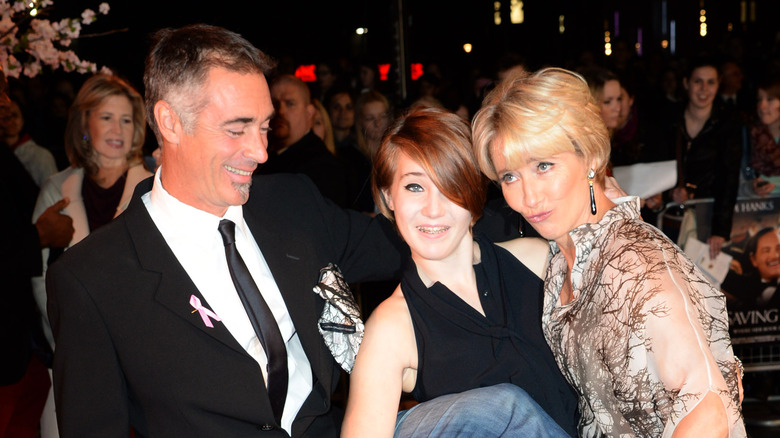 Greg Wise, Gaia Wise, and Emma Thompson posing