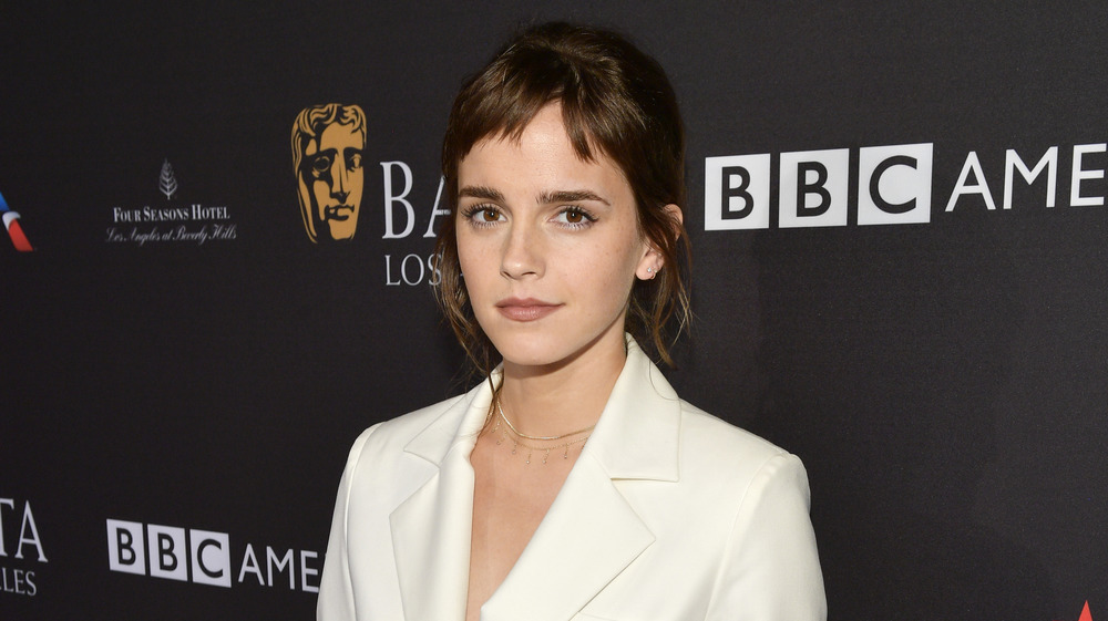 Emma Watson in a white suit on the red carpet