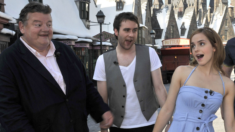 Robbie Coltrane, Matthew Lewis, and Emma Watson at Universal Studios