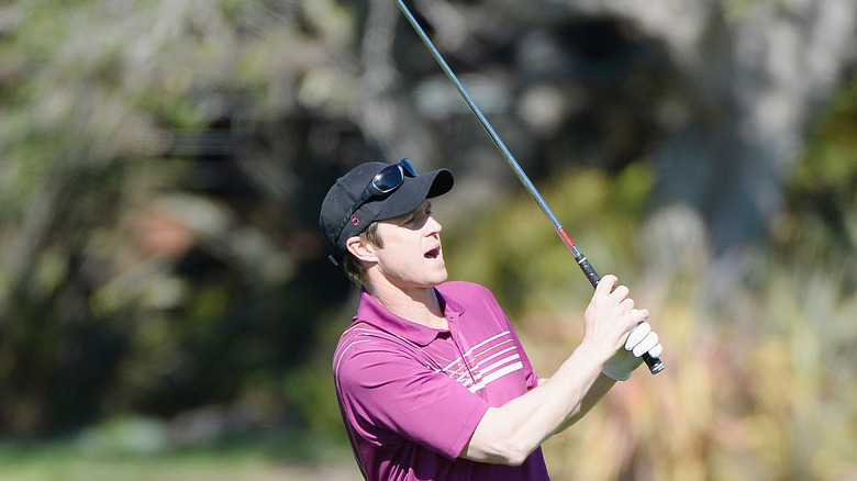 Eric Close playing golf 