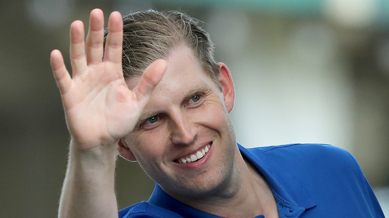 Eric Trump waves