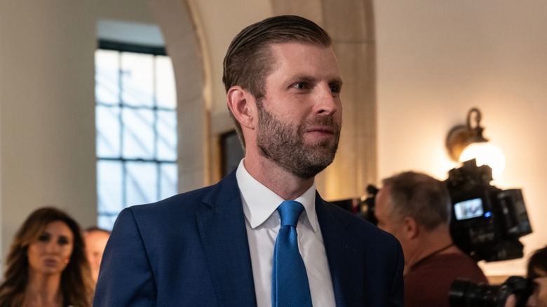 Eric Trump in a navy blue suit