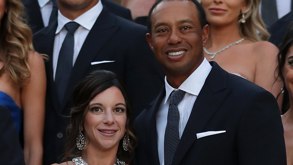 Tiger Woods and Erica Herman smiling