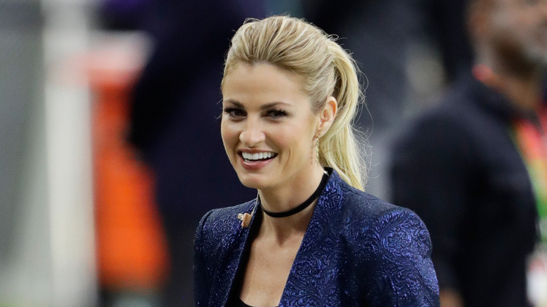 Erin Andrews smiles on the sidelines