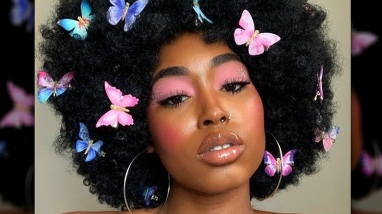 Ethereal makeup with butterfly clips