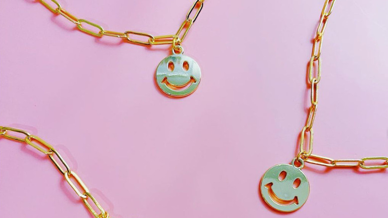 Gold smiley face necklaces 