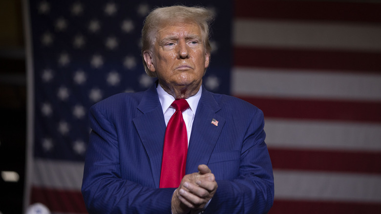 Donald Trump clapping at an event